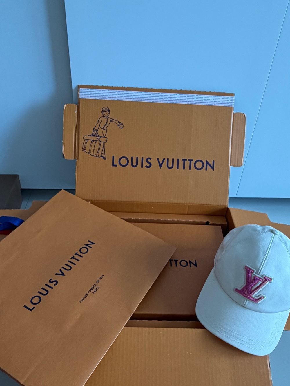 Louis Vuitton Woman’s White Cap with Pink LV Logo